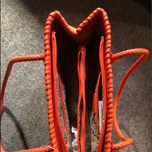 Carved leather, pumpkin color purse/bag